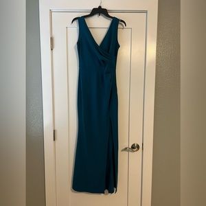 Beautiful teal size small long slit dress.
